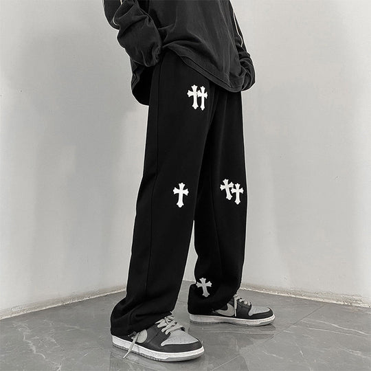 Herren weite Baumwoll-Jogginghose mit Allover-Kreuzprint und elastischem Tunnelzugbund Nord Taschen