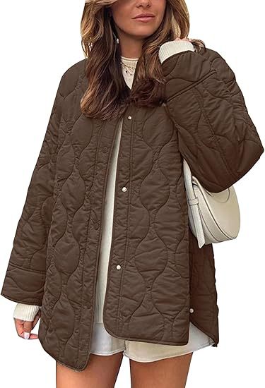 Damen Steppjacke im Oversize Design mit gewölbter Steppung und seitlichem Schlitz Nord Taschen