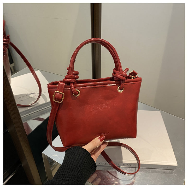 Damen Handtasche mit geflochtenem Tragegriff Nord Taschen