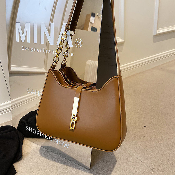 Damen Schultertasche mit elegantem Kettenverschluss und modernem Design Nord Taschen