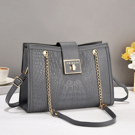 Damen elegante Handtasche mit Krokodilprägung und goldenen Beschlägen Nord Taschen