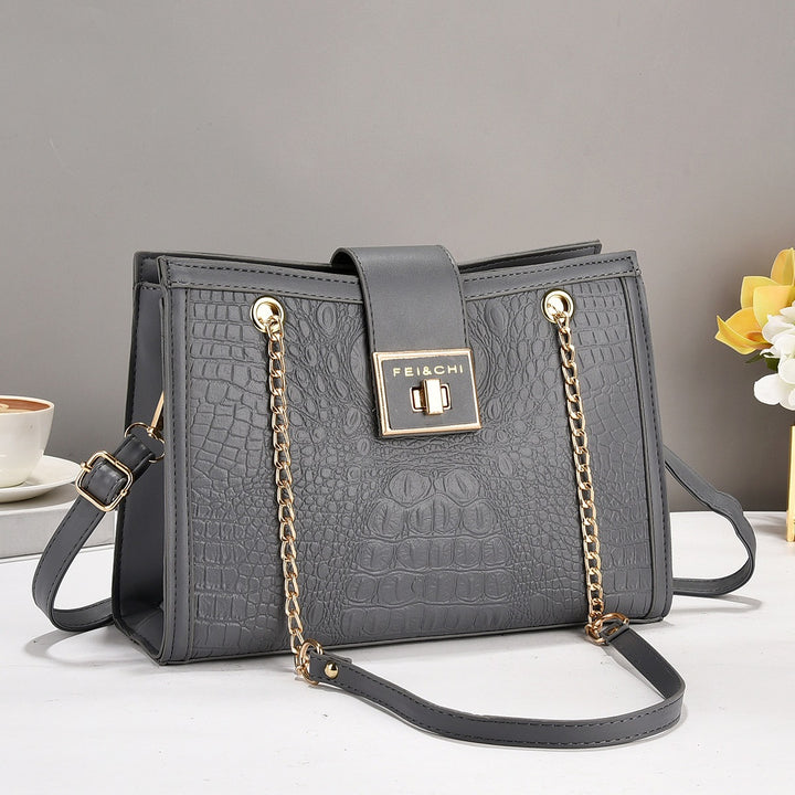 Damen elegante Handtasche mit Krokodilprägung und goldenen Beschlägen Nord Taschen