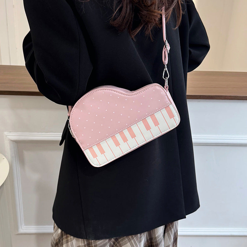 Damen Clutch-Tasche mit verspieltem Klavier-Design Nord Taschen