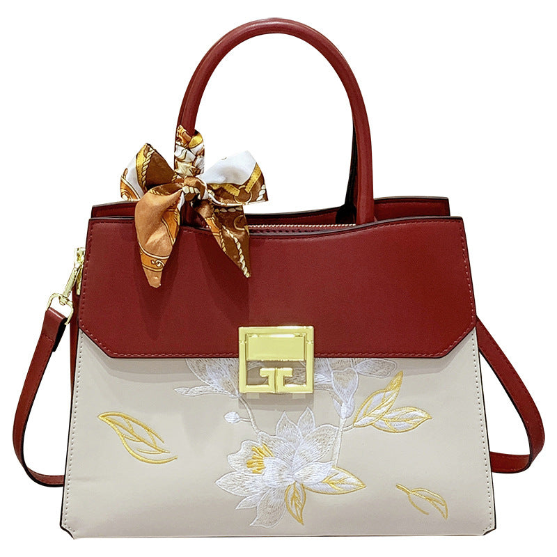 Damen Handtasche mit elegantem floralem Design und praktischen Trageoptionen Nord Taschen
