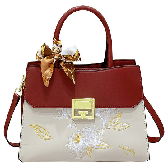 Damen Handtasche mit elegantem floralem Design und praktischen Trageoptionen Nord Taschen