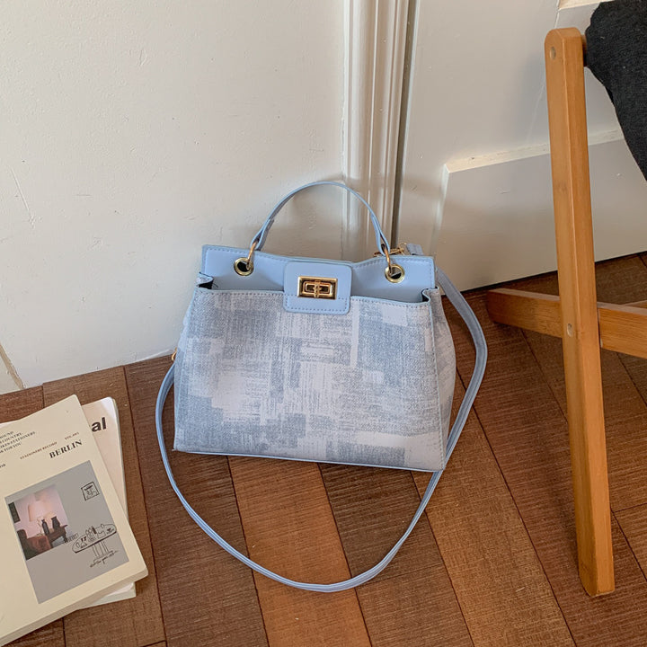 Damen elegante Umhängetasche mit luxuriösem Lederlook und geschmackvollem Verschluss Nord Taschen
