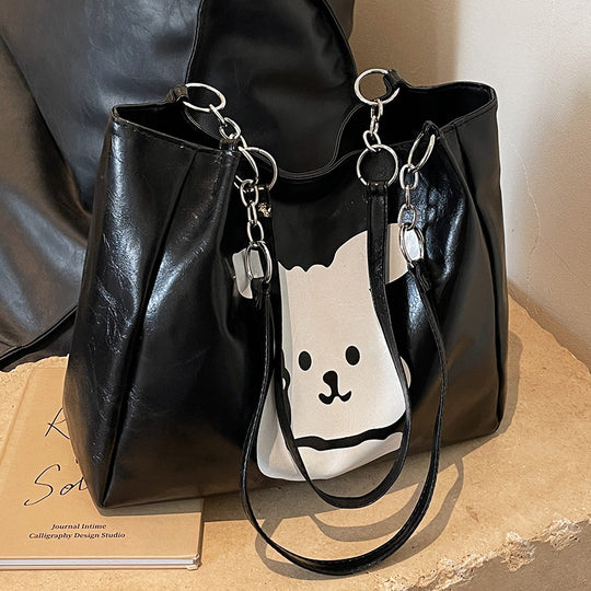Damen Umhängetasche aus hochwertigem Kunstleder mit verspieltem Tierdesign Nord Taschen