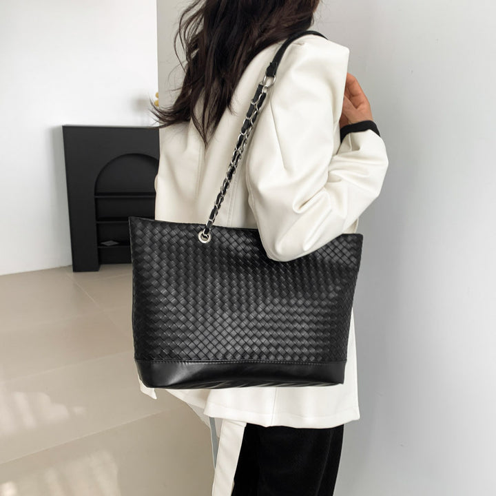 Damen Handtasche aus geflochtenem Kunstleder Nord Taschen