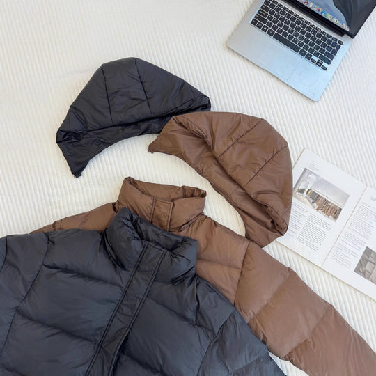 Damen Gepolsterte Kapuzen‑Steppjacke mit hohem Kragen und Oversize‑Silhouette Nord Taschen