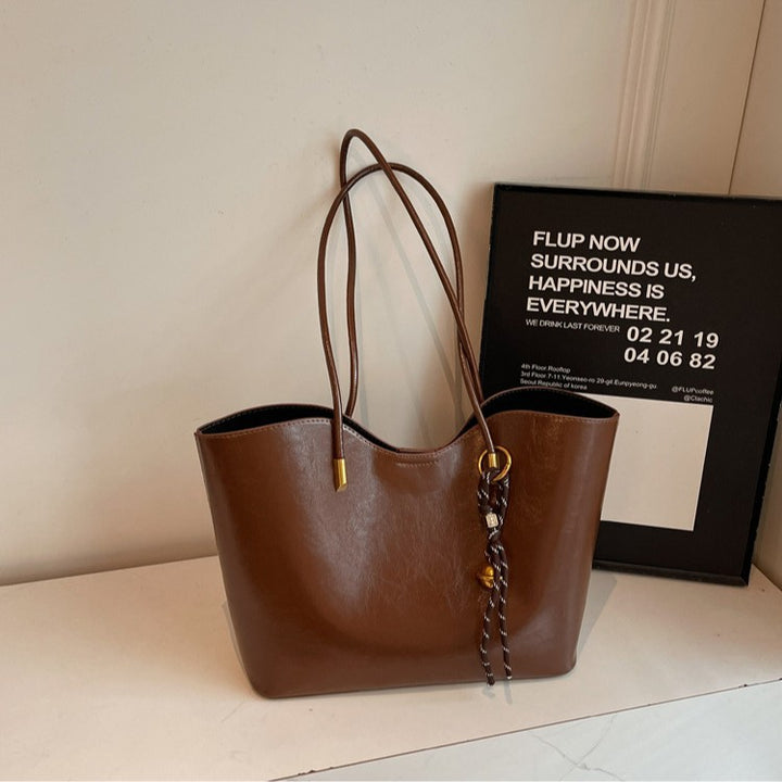 Damen elegante Shopper-Tasche mit dekorativem Anhänger Nord Taschen