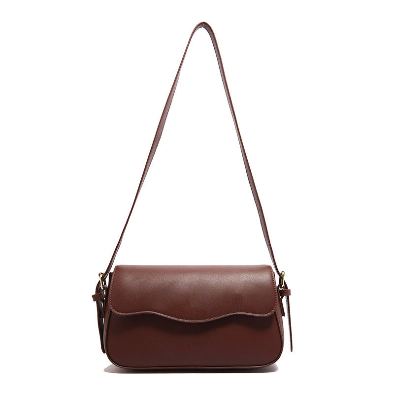 Damen Umhängetasche mit elegantem Wellenmuster Nord Taschen