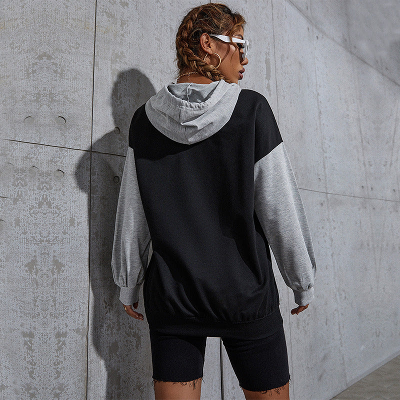 Damen Oversize Sweatshirt mit Kapuze, Kontrastärmeln und Kängurutasche Nord Taschen