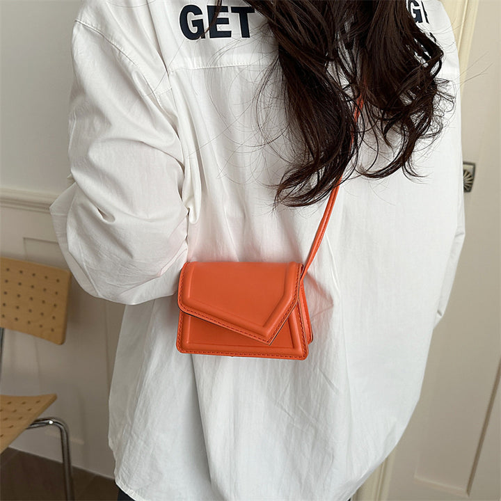 Damen Mini-Handtasche mit eleganter Klappverschlusstechnik Nord Taschen