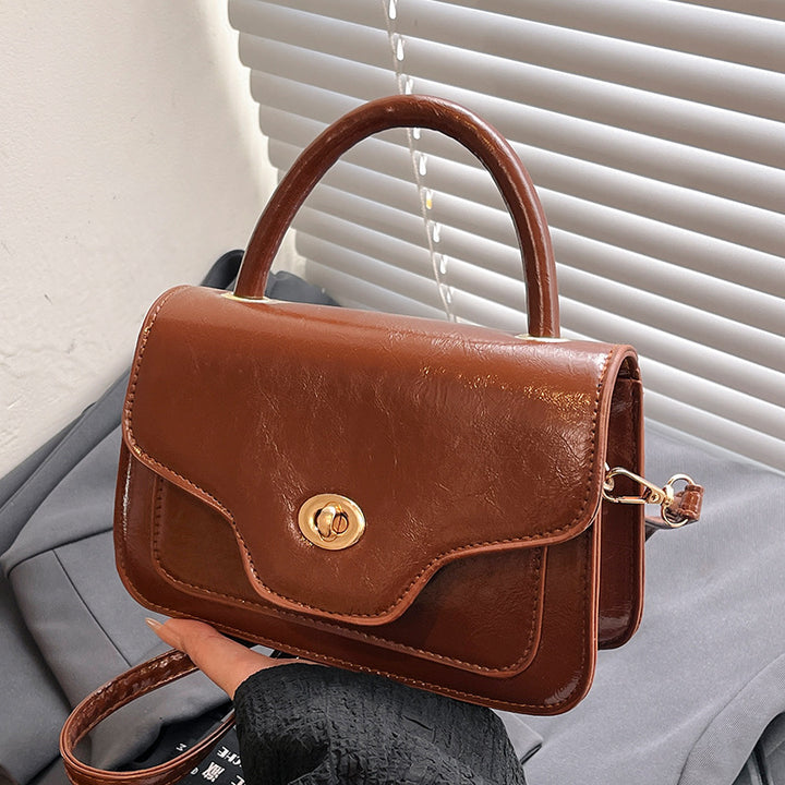 Damen Handtasche mit hochwertigem Kunstleder und elegantem Klappenverschluss Nord Taschen