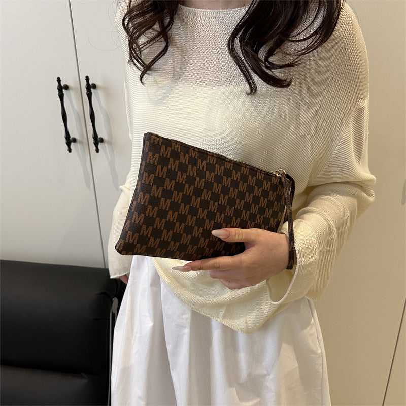 Damen Clutch mit elegantem Ringgriff Nord Taschen