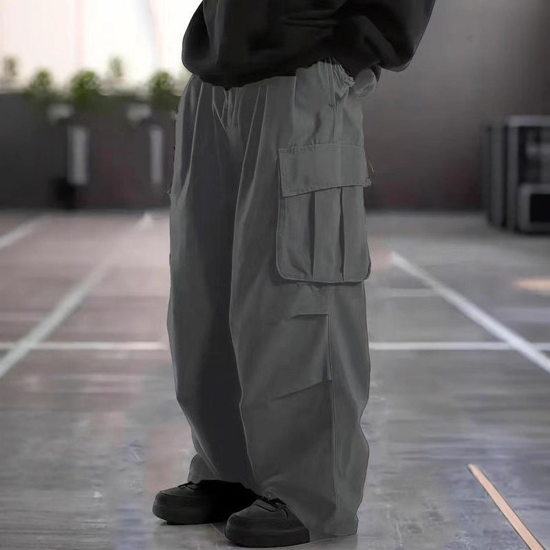 Herren Oversize-Baggy-Cargohose im Urban-Utility-Stil mit elastischem Tunnelzugbund und Mehrfachklappentaschen Nord Taschen