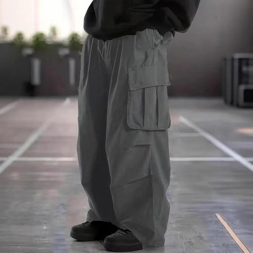 Herren Oversize-Baggy-Cargohose im Urban-Utility-Stil mit elastischem Tunnelzugbund und Mehrfachklappentaschen Nord Taschen