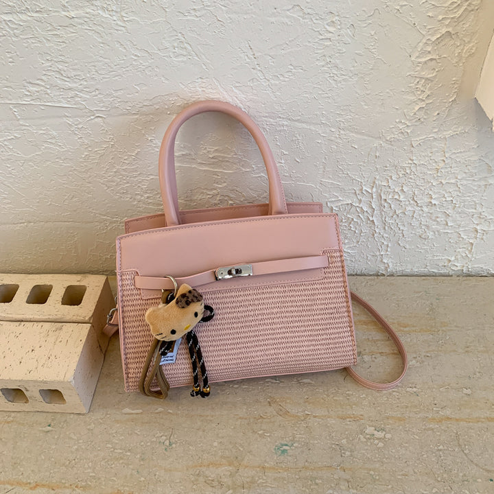 Damen elegante Handtasche mit hochwertigem Strickdesign und charmantem Anhänger Nord Taschen