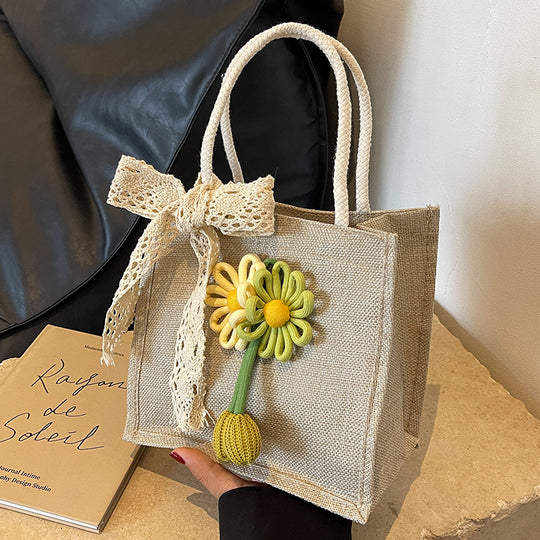 Damen Jute-Tasche mit dekorativer Blumenapplikation und verspieltem Schleifenverschluss Nord Taschen