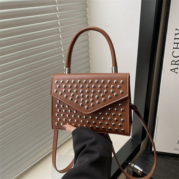 Damen elegante Handtasche mit Nieten und abnehmbarem Schulterriemen Nord Taschen