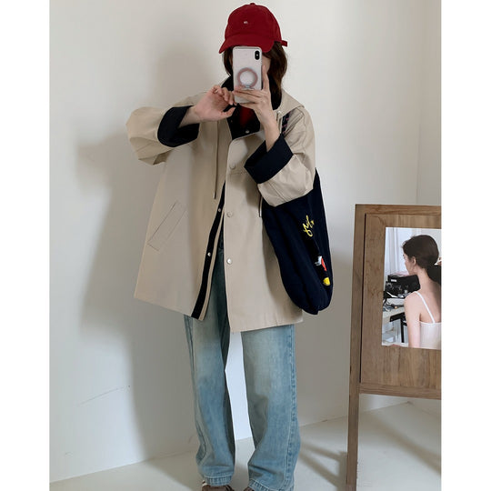 Damen Oversize Kapuzenjacke mit kontrastiertem Saum und Druckknopfleiste Nord Taschen