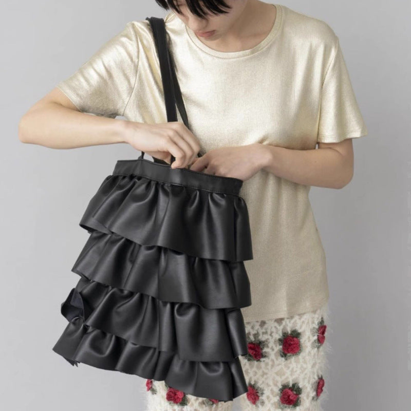 Damen Handtasche mit voluminösem Rüschendesign Nord Taschen