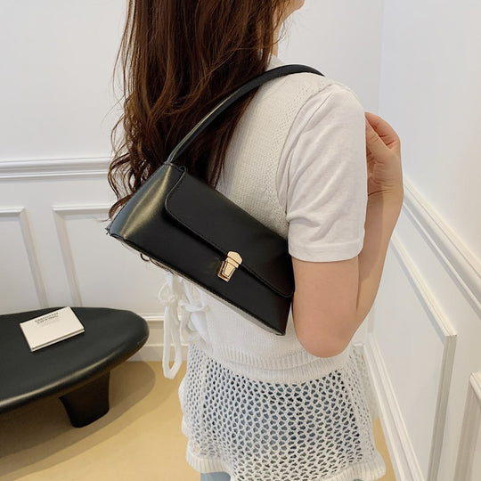 Damen moderne Umhängetasche mit elegantem Klappverschluss Nord Taschen