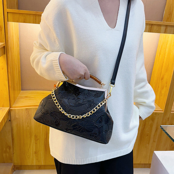 Damen elegante Handtasche mit floralem Präge-Design Nord Taschen