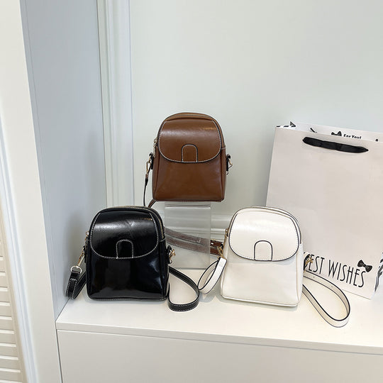 Damen edle Umhängetasche mit elegantem Klappverschluss und verstellbarem Riemen Nord Taschen
