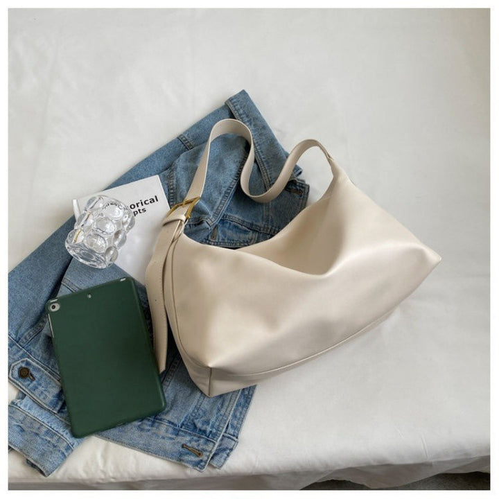 Damen Hobo-Tasche aus hochwertigem Leder mit elegantem asymmetrischem Design Nord Taschen