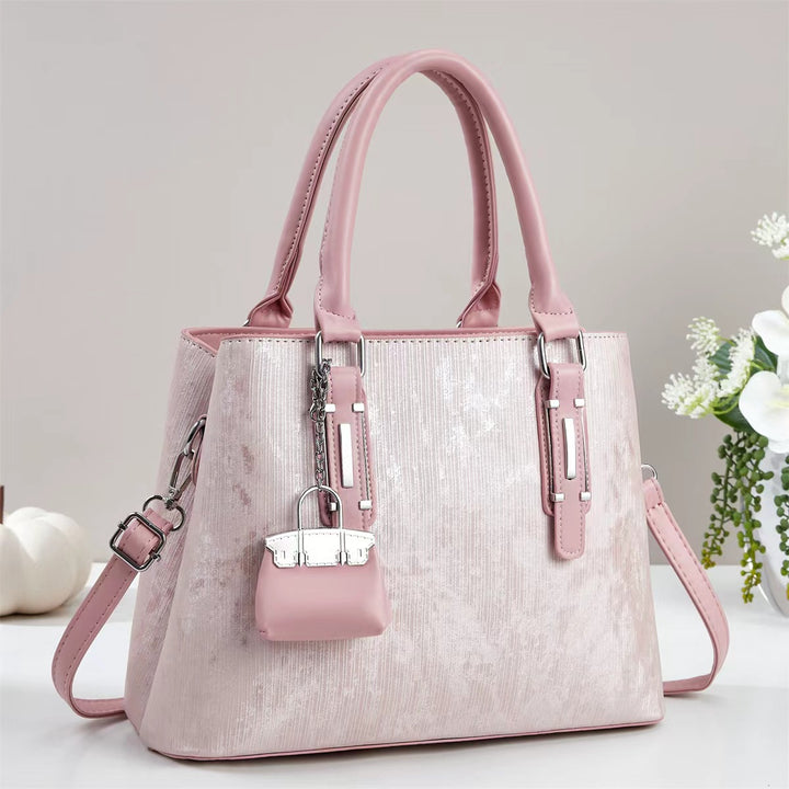 Damen elegante Handtasche mit dekorativem Schlüsselanhänger Nord Taschen