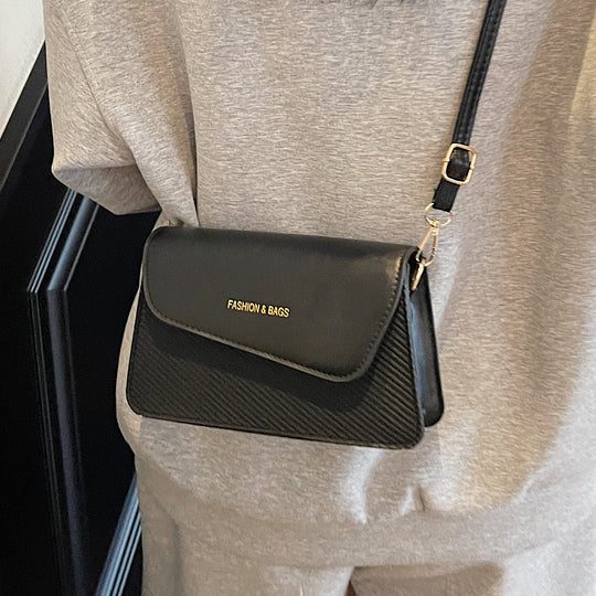 Damen Umhängetasche im stilvollen Kombi-Design mit hochwertigem Leder und gewebtem Stoff Nord Taschen
