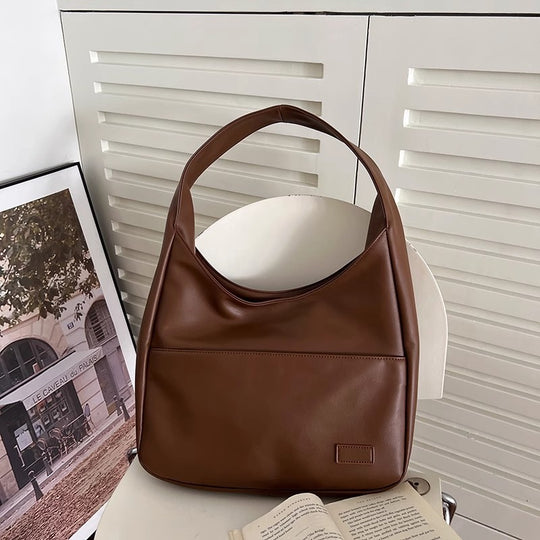 Damen Hobo-Tasche mit modernem, geschwungenem Design und schadstofffreiem Kunstleder Nord Taschen