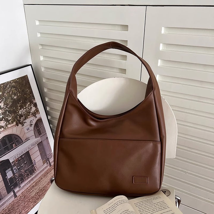 Damen Hobo-Tasche mit modernem, geschwungenem Design und schadstofffreiem Kunstleder Nord Taschen