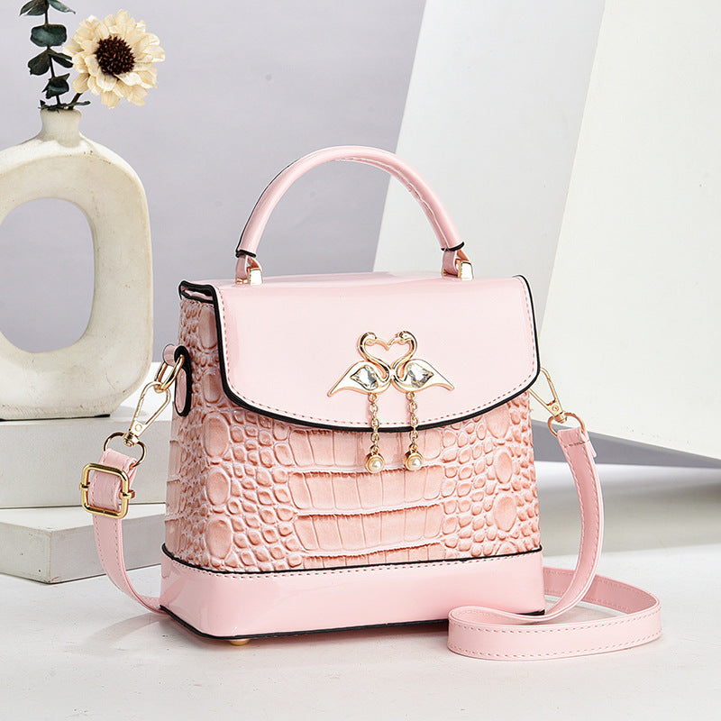 Damen elegante Handtasche im stilvollen Krokodil-Look mit einzigartigem Verschluss Nord Taschen