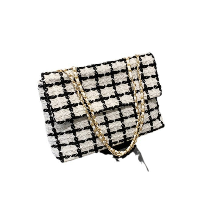 Damen Clutch-Tasche im zeitgenössischen Design mit strukturiertem Muster Nord Taschen