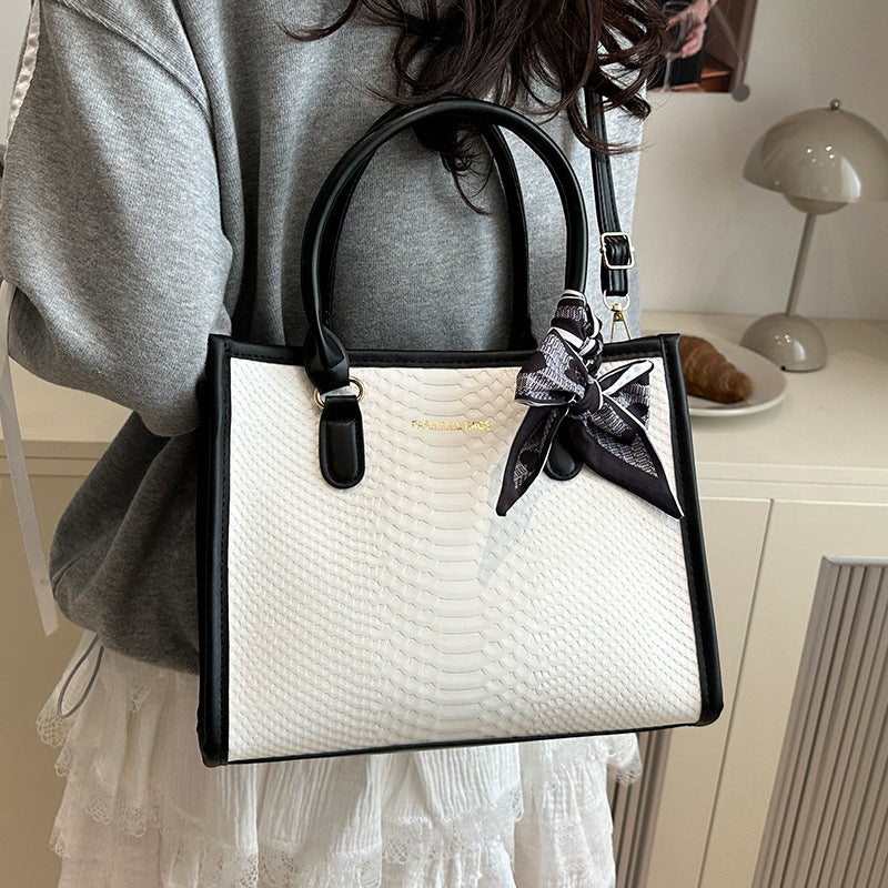 Damen stilvolle Handtasche mit geflochtenem Design und dekorativem Schleifenband Nord Taschen