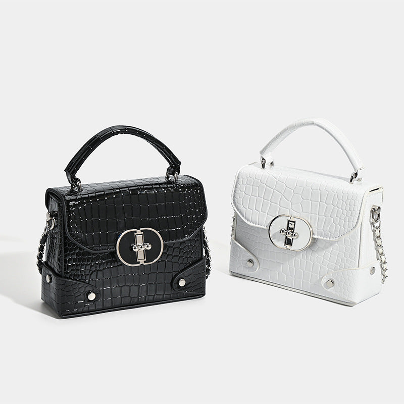 Damen Umhängetasche mit edlem Kroko-Look und luxuriösem Kettenverschluss Nord Taschen