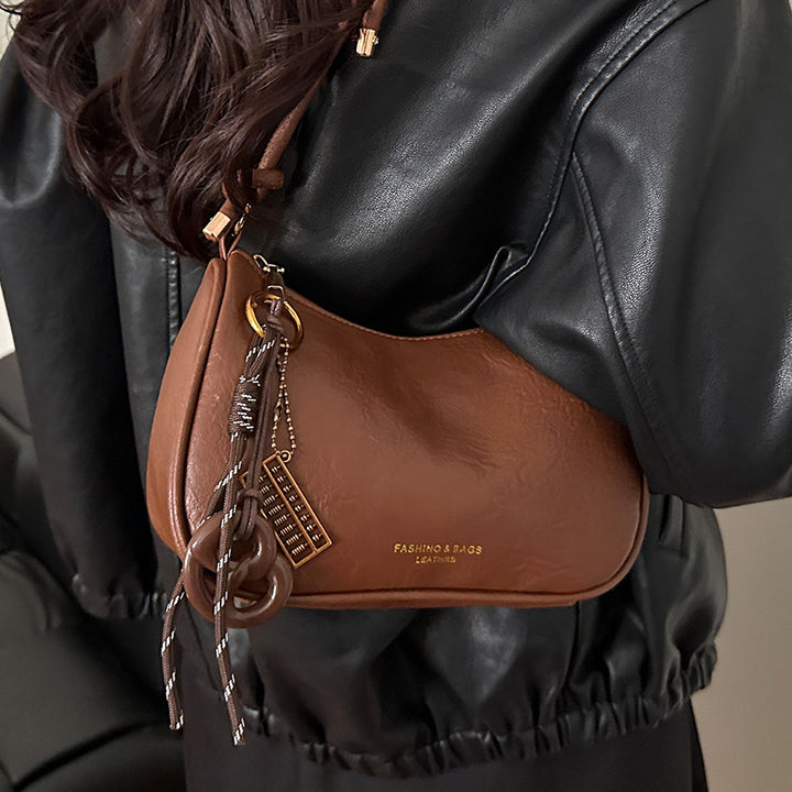 Damen Umhängetasche aus hochwertigem Kunstleder mit elegantem Knotenverschluss Nord Taschen