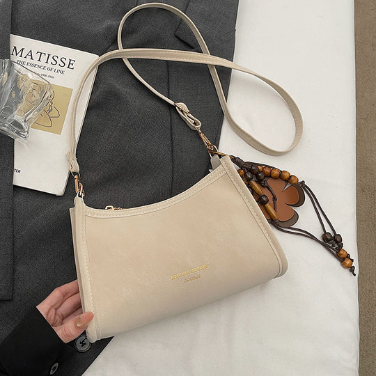 Damen Umhängetasche aus hochwertigem Kunstleder mit elegantem Reißverschluss Nord Taschen