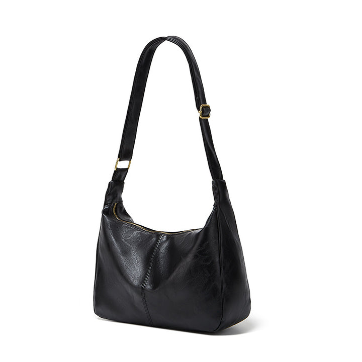 Damen Hobo-Handtasche mit weichem Kunstleder und elegantem Tragegurt Nord Taschen