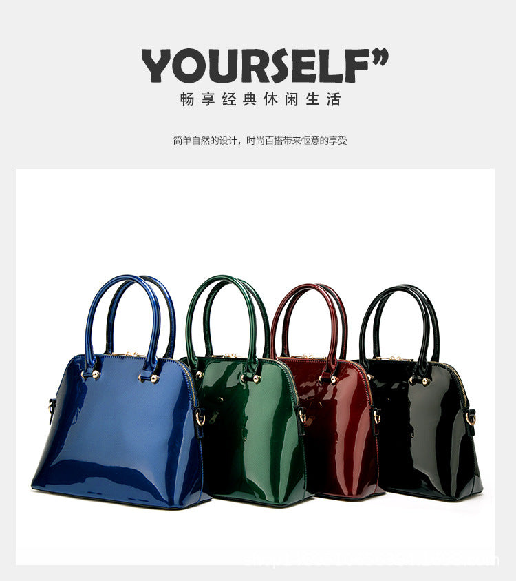Damen Handtasche mit elegantem Hochglanzfinish und goldenen Verzierungen Nord Taschen