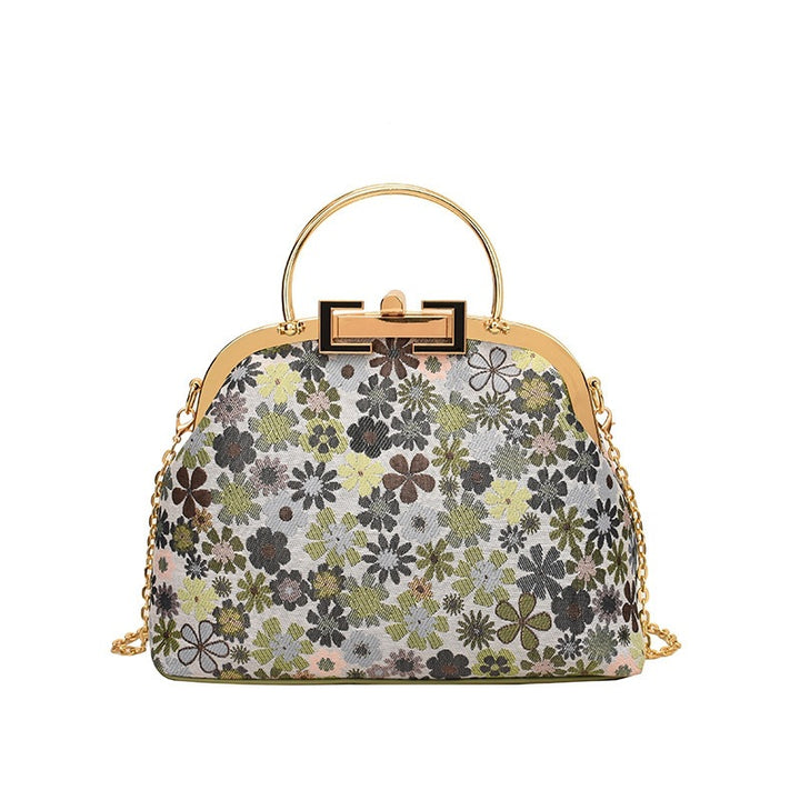 Damen elegante Umhängetasche mit floralen Akzenten und goldenen Verzierungen Nord Taschen