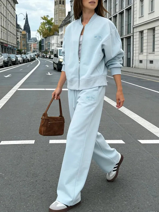 Damen Oversize Sweatjacke mit Reißverschluss und weite Jogginghose Freizeit-Set Nord Taschen