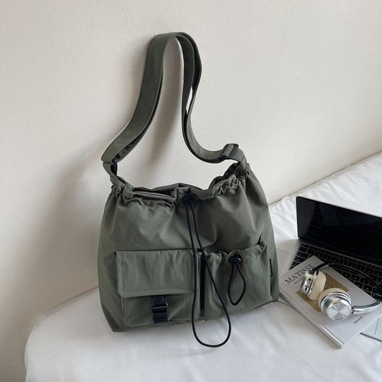 Damen Umhängetasche mit verstellbarem Kordelzug und praktischen Taschen Nord Taschen