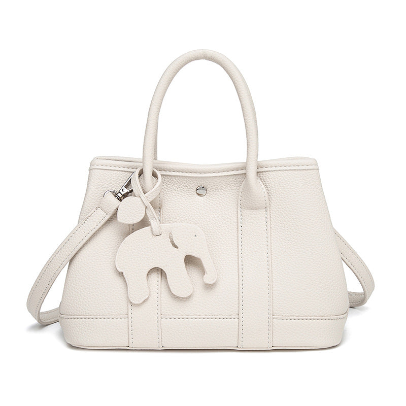 Damen Handtasche mit abnehmbarem Elefantenanhänger und elegantem Kunstleder Nord Taschen