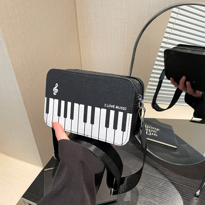 Damen Umhängetasche mit musikalischem Klaviertastendesign Nord Taschen