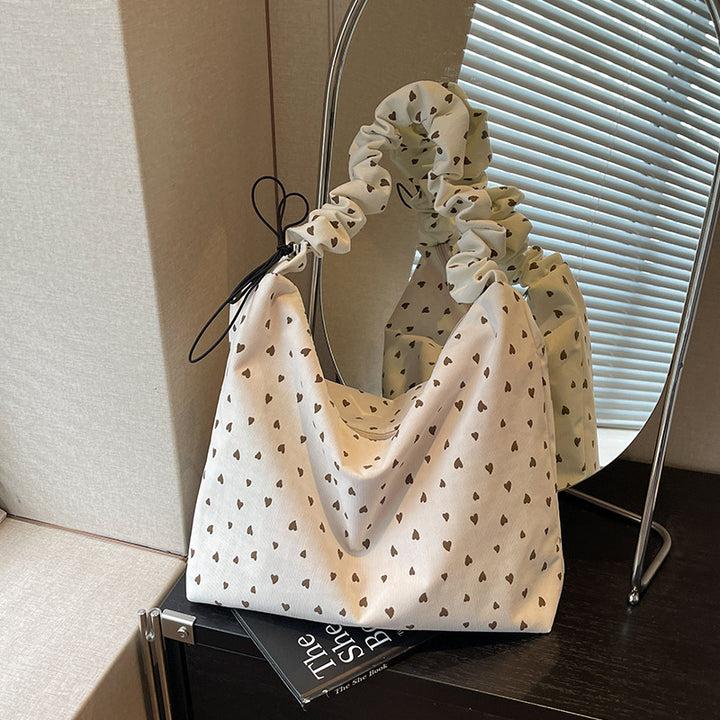 Damen Hobo-Tasche mit verspieltem Herzdesign und elastischen Trageriemen Nord Taschen