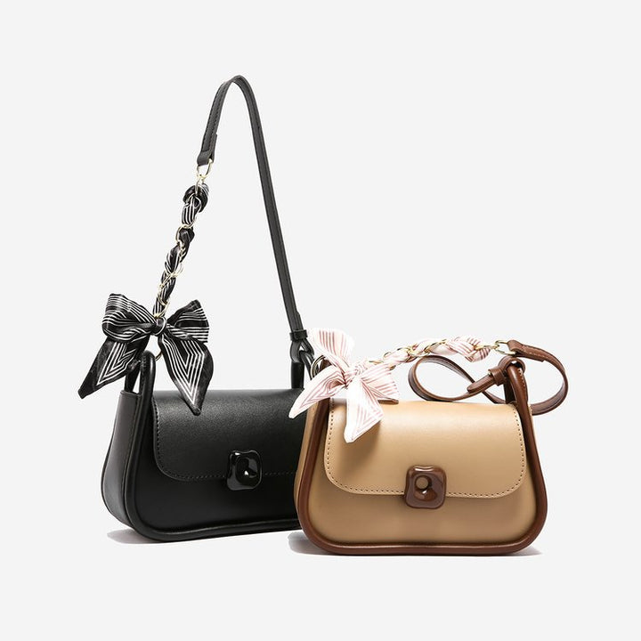 Damen Umhängetasche mit modischem Schleifenakzent und eleganter Struktur Nord Taschen