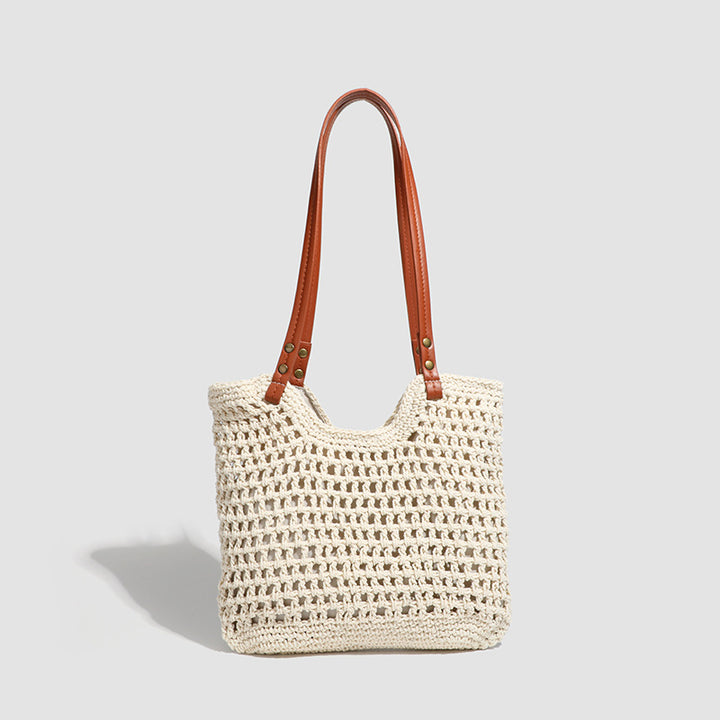 Damen Handtasche aus gewebtem Naturmaterial mit eleganten Lederakzenten Nord Taschen